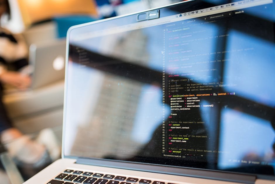 Developer comparing AI agent frameworks on laptop