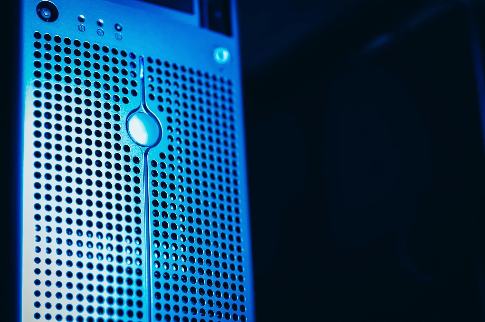 Server rack with glowing lights representing dedicated Postgres infrastructure for SaaS